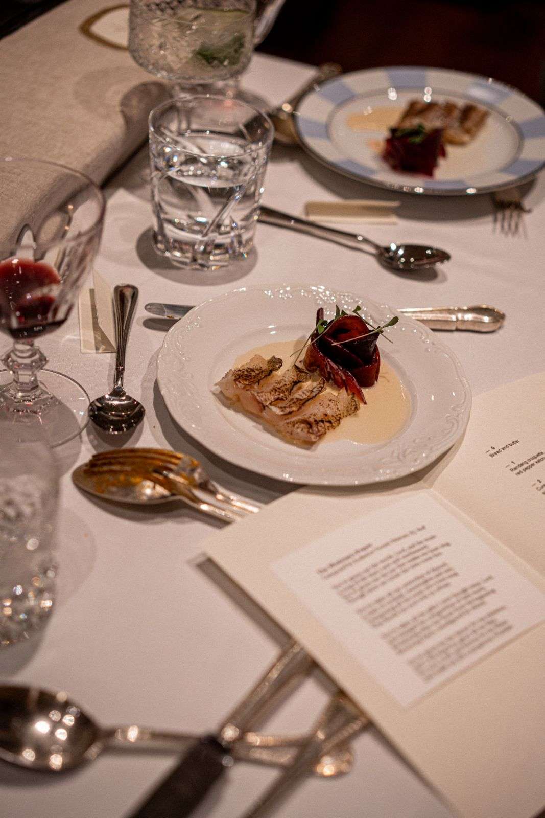 A closed room, a long table.
